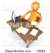 Orange Employee Seated at a Wooden Desk and Using a Laptop While Doing Paperwork at the Office