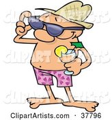 Relaxed Guy in Shorts, Holding a Cocktail and Adjusting His Sunglasses While on Vacation