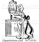 Retro Black and White Woman Looking at a Mirror at Her Vanity Table