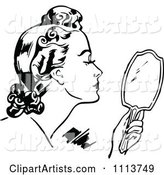 Retro Black and White Woman Using a Hand Mirror